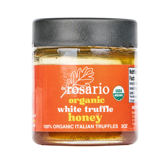 Jar of del Rosario organic white truffle honey on a white background