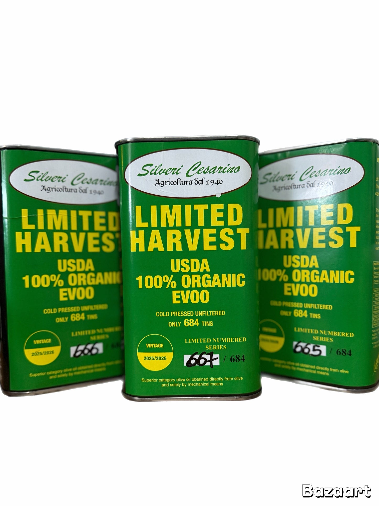Three green tins of Limited Harvest USDA 100% Organic EVOO on a white background