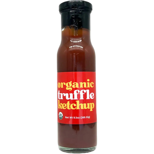 Bottle of organic truffle ketchup with a red label on a white background